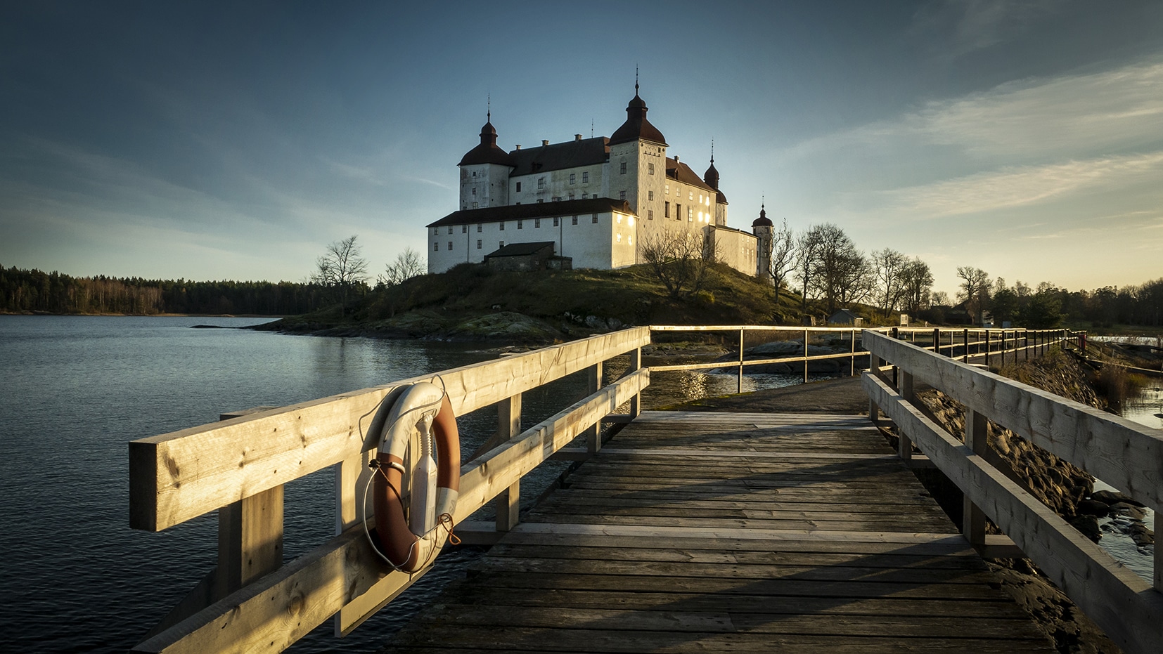 Château Läckö coucher soleil ponton mer