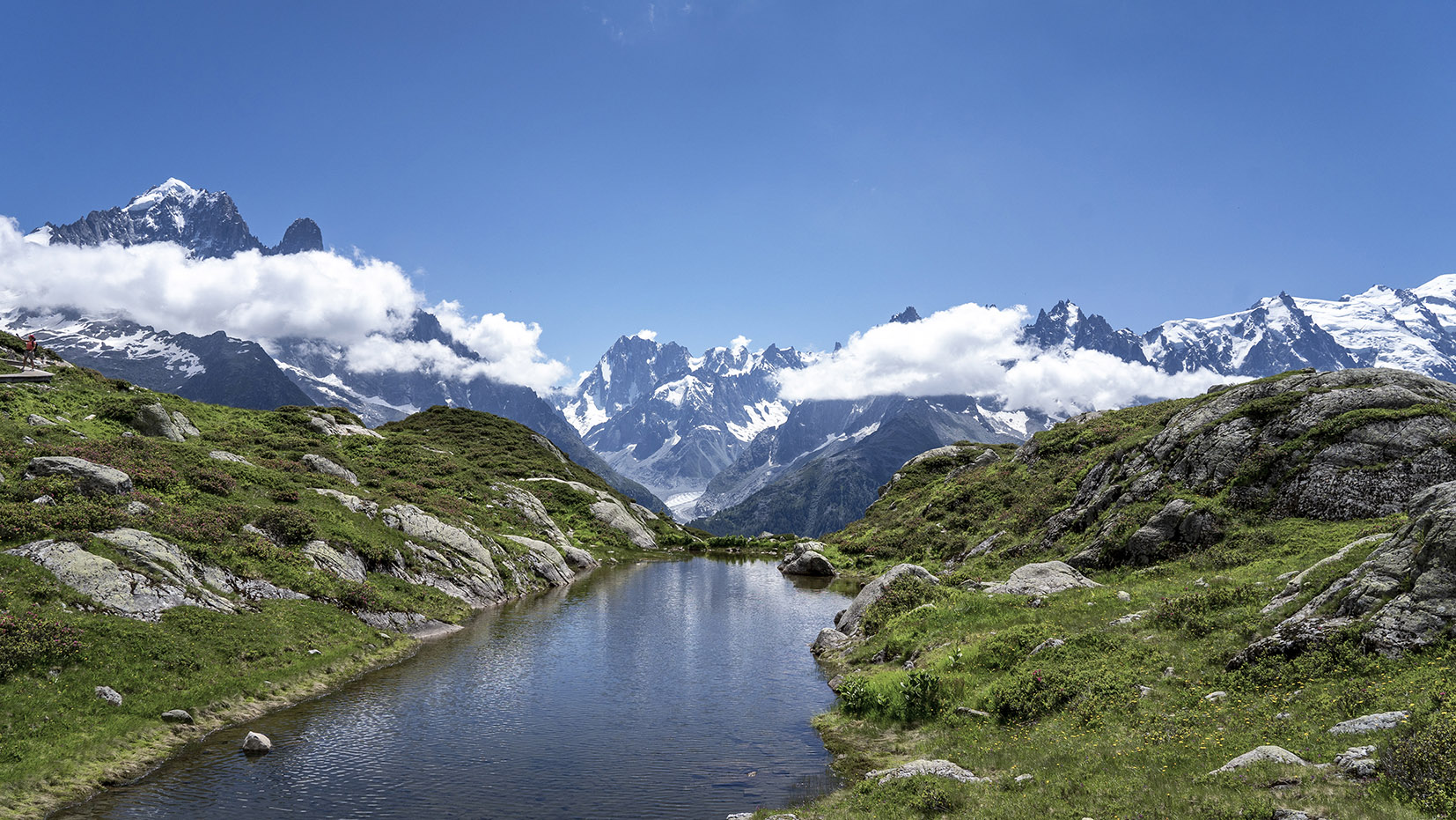 randonnée lac Blanc montagnes neige nuages